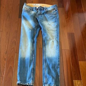 Guys stacked blue jeans from Europe